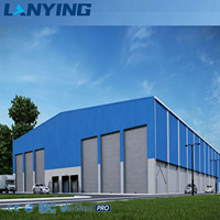 Almacén de Estructura de Acero Prefabricada, Edificio con Estructura de Acero, Instalación de Almacenamiento Industrial con Puertas Enrollables y Plataforma de Carga