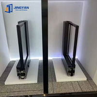 Fenêtres à battants en aluminium noir à double vitrage résistantes aux ouragans de style américain, ouverture par manivelle, acier inoxydable