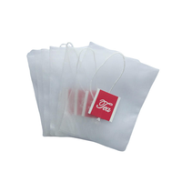 Meilleur prix, qualité alimentaire, logo personnalisé, sachet de thé en nylon thermoscellable de haute qualité avec cordon pour l'emballage des feuilles de thé