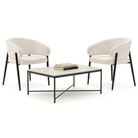 Fauteuil ergonomique moderne à dossier incurvé, revêtu de tissu bouclé, avec pieds en métal noir
