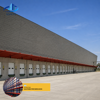 Entrepôts entièrement fermés en structure métallique avec portes coulissantes pour le stockage industriel