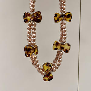 Collar de perlas de imitación con lazo, joyería de fiesta de doble capa para mujer - Product Image 1