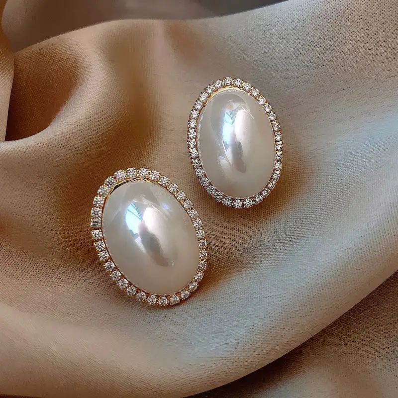 Mode korea anting mutiara desain perhiasan impor wanita grosir N2311250