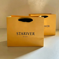 Sac cadeau en papier mat jaune chaud avec poignée en ruban noir, logo imprimé personnalisé, sac de shopping de luxe pour boutique