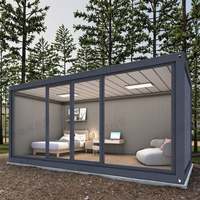 Maison modulaire préfabriquée en conteneur facile à assembler Maison préfabriquée en verre détachable Maison mobile Sandwich Hôtels Chambres à coucher