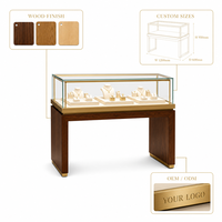 Table de présentation de bijoux éco-responsable avec éclairage LED, base en bois et plateau en verre, couleurs personnalisables pour les boutiques de luxe