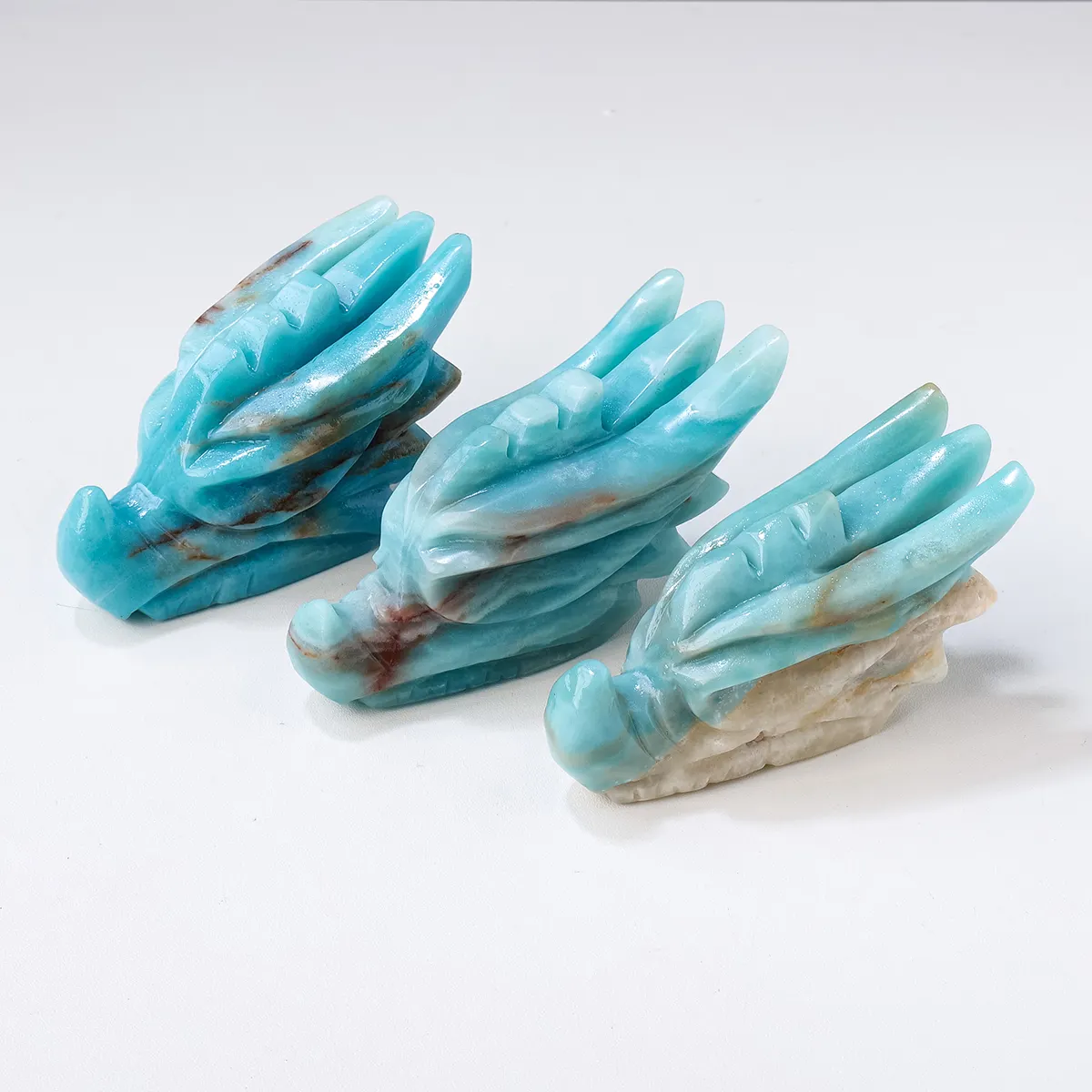 Artesanía de cristal natural de alta calidad, piedras preciosas hechas a mano, calaveras de dragón azul cielo para Decoración