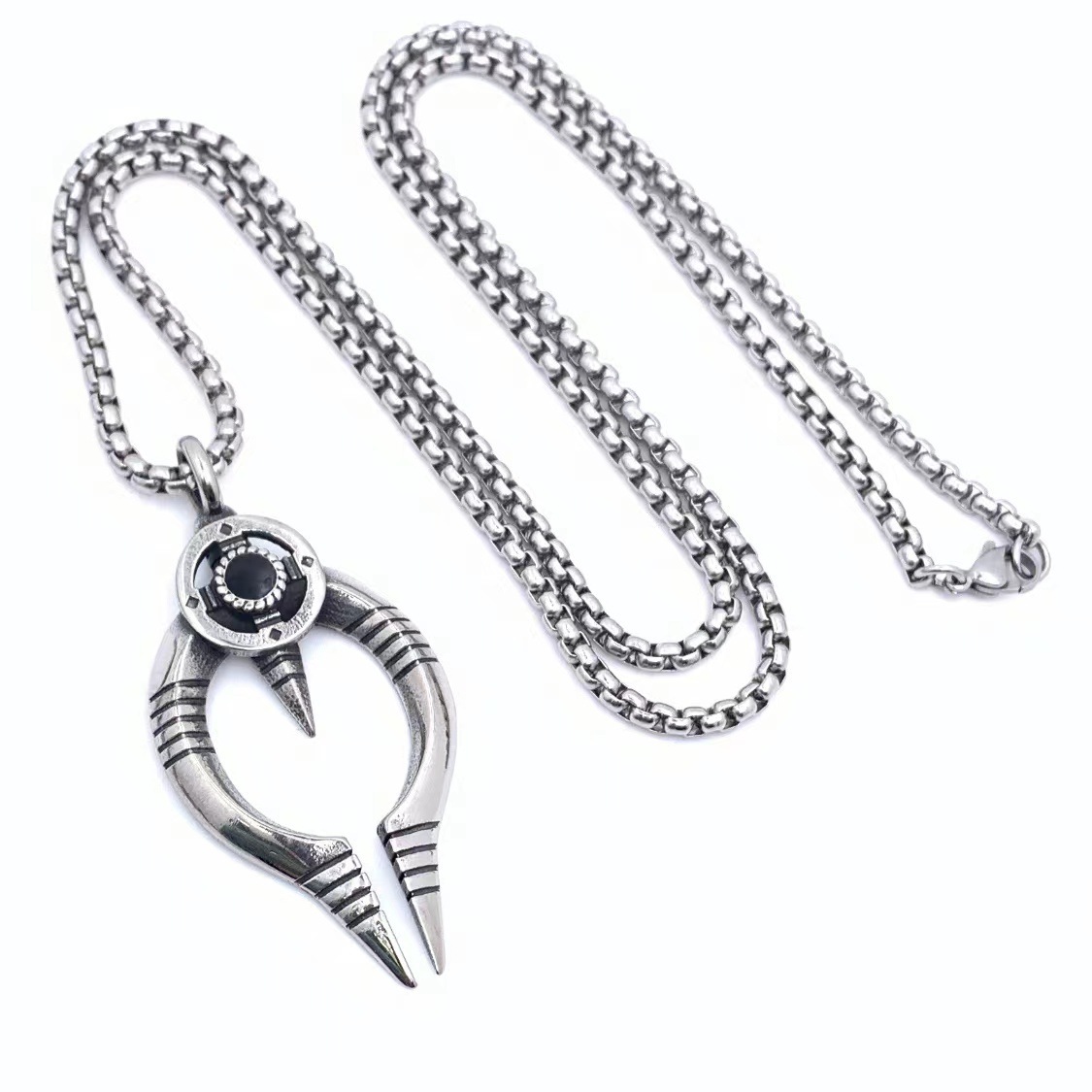 Black stone pendant with a 60cm long chain