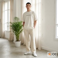 T-shirt Oversize Minimaliste avec Slogan en Coton Peigné 260 GSM 100% pour Homme, Personnalisation OEM Texte Français, Streetwear Luxe Discret, MOQ50