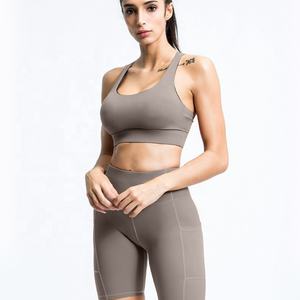 Ventas calientes Active Wear Gym Seamless Halter Backless Bra Shorts con bolsillo Se puede imprimir logo Mujeres Fitness Yoga Set para mujeres - Product Image 4