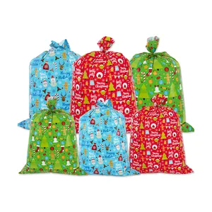 Grand sac cadeau de Noël pour la fête de Noël pour l'emballage de cadeaux Sac cadeau géant en plastique Jumbo Taille assortie avec carte-cadeau