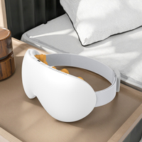 Appareil de soulagement des maux de tête de masseur oculaire électrique rechargeable à compression d'air chaud et froid