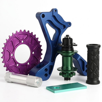 Pièces en alliage de titane anodisé usinées par CNC pour moto, logo personnalisé, adaptateur de frein à disque de vélo, repose-pieds