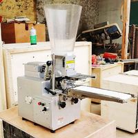 Machine intelligente pour la fabrication de wontons, de pelmeni et d'empanadas