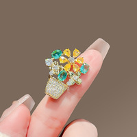 Broche fleur en cristal pour femmes haut de gamme accessoire de vêtements de corsage anti-exposition exquis avec style de broche de Design de mode