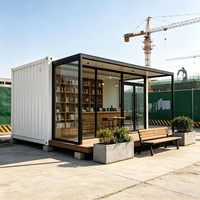 Atelier préfabriqué moderne en conteneur avec mur entièrement vitré, alimenté à l'énergie solaire et étanche, pour usage professionnel ou commercial