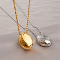 Collier pendentif long en acier titane ovale, style luxe léger et design original, pour femme