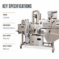 Machine à paner industrielle pour la production de nuggets de poulet frit sur une ligne de production dans une usine de transformation d'aliments surgelés