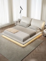 Lit double en bois avec rangement suspendu, en cuir véritable, style minimaliste italien moderne, design oreilles d'éléphant flottantes