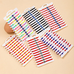 Pulsera Tejida de Poliéster con Diseño de Mariposa Bohemia y Siete Nudos, con Cuerdas Rojas de la Suerte y Ojo Azul, para Niños, Estilo Europa América - Product Image 1