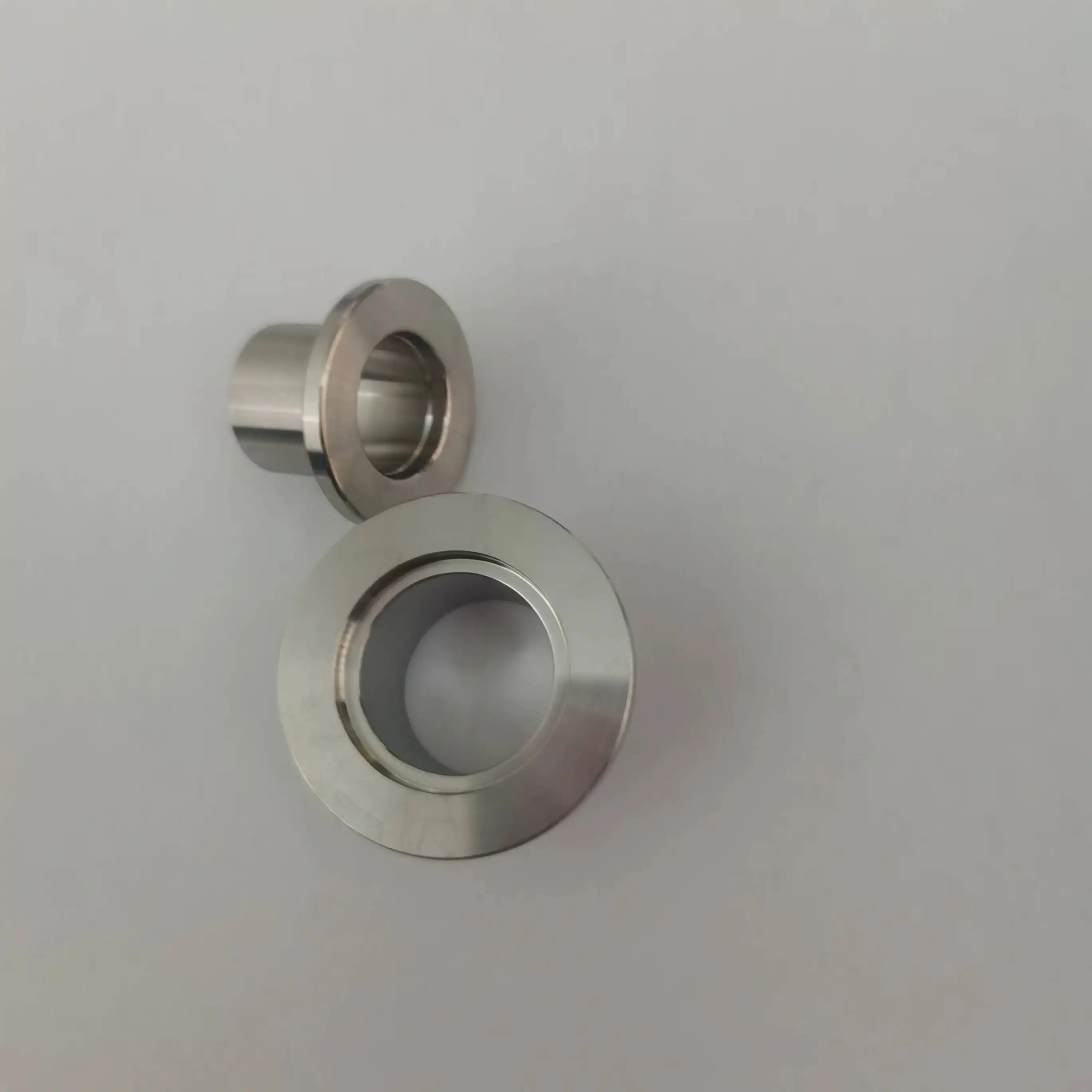 Trung Quốc Nhà cung cấp steel304 không gỉ vệ sinh chân không phụ kiện đường ống ISO kf25 90 độ khuỷu tay