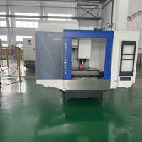 Machine de fraisage CNC industrielle V1000 avec ATC, table de travail 1100*420mm, cadre en fonte haute rigidité