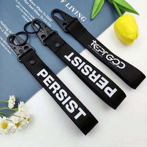 Dragonne noire personnalisée avec porte-clés, porte-étiquette et mousqueton à broderie tissée bec d'aigle pour promotions - Product Image 3