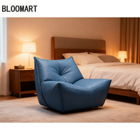 Confortable entièrement en cuir véritable une chaise éponge vers le bas en peluche remplissage cadre en bois en acier au carbone noir mat Base de plateau tournant