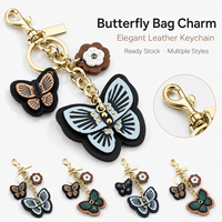 Élégant porte-clés en cuir avec fleur de camélia et papillon, pendentif de sac, ornement suspendu doré, cadeau pour femme, décoration