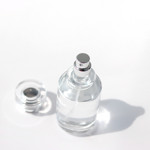 Nueva llegada 100mL botella de cristal de Perfume con forma de cilindro de cuello escalonado transparente con tapa plateada - Product Image 3