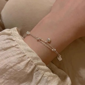 Pulsera Tichi minimalista, versátil y distintiva de plata S925 de doble capa con forma de corazón para mujeres con estilo discreto. - Product Image 4
