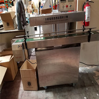 Machine de scellage par induction thermique de feuille d'aluminium de bouchon continu de revêtement de bouteille en plastique électromagnétique automatique de vent froid