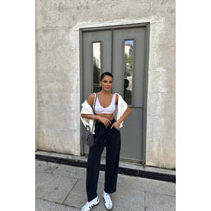 กางเกงขายาวเอวสูงสีดำสำหรับผู้หญิง ทรงขากว้าง ปิดด้วยเชือกผูก ระบายอากาศได้ดี ทำจากหนัง พิมพ์ลายด้านหน้า สีซีดสไตล์ลำลอง - Product Image 3