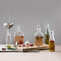 Bouteilles en verre de poche de 500 ml en gros avec bouchon hermétique en acier inoxydable à bascule, emballage en verre pour boissons de 17 oz