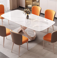 Table à manger rectangulaire en pierre frittée brillante de luxe léger, style célébrité internet, en acier au carbone, mobilier de maison assemblé