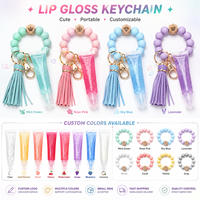 Porte-clés brillant à lèvres personnalisable avec finition brillante, rechargeable et hydratant, impression de logo en petites séries