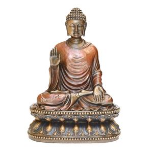 Nirmala Handicrafts - Estatua de Buda de Resina de Poliéster con Acabado en Bronce/Cobre, Buda Sentado Hecho a Mano, Decoración Religiosa para el Hogar - Product Image 1