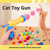 Pistolet lanceur de pompons en plastique écologique à haute élasticité jouet pour chat populaire anti-ennui résistant aux morsures bâton teaser et balle pour animaux de compagnie