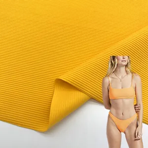 Textile fabric orange quick dry knitted textured rib 4 way stretch nylon spandex stripe swimsuit fabrics ribbed