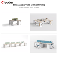 Poste de travail en open space pour 2 à 8 personnes, avec bancs, pieds en boucle, plateau en mélamine, cloison acoustique et armoire mobile