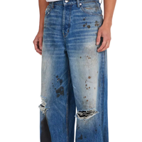 Jean en denim déchiré et vieilli, coupe large et décontractée, à jambe évasée, longueur pleine, uni, pour usage quotidien