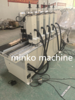Machine de perçage automatique verticale multi-têtes pour le perçage de trous de charnières et de serrures de portes d'armoires
