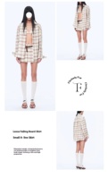 Ensemble deux pièces à carreaux en lin rétro jupe trapèze à la mode et chemise droite taille ensemble de printemps avec haut tissé ensembles élégants
