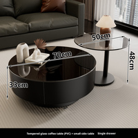 Table basse moderne de luxe légère en verre trempé rond avec double tiroir de rangement et structure métallique pour salon