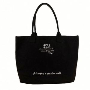 Sac à bandoulière en toile personnalisé avec logo estampé à chaud, grand sac fourre-tout en toile de coton noir - Product Image 5