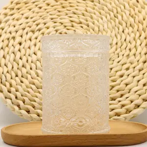 Custom Luxury Candle Jars Embossed Daisy Pattern Shape Glass Candle Jars With Lids Candle Jars