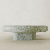 Table basse en marbre vert DH, forme de galet arrondie, dalle épaisse et solide, piédestal à double cylindre, style organique moderne pour salon