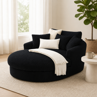 Fauteuil en velours côtelé noir et crème, canapé d'appoint rond contrastant, style bohème moderne, pièce maîtresse de luxe pour le salon