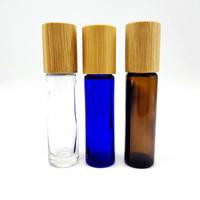 Flacon en verre à bille de 5 ml et 10 ml, transparent, ambré ou bleu, avec couvercle en bambou, pour huile essentielle, massage, huile corporelle