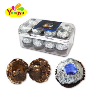Nouveauté : Bonbons au chocolat en forme de boule croustillante aux noisettes, enveloppés de feuille d'argent, boîte transparente de 16 pièces, vente en gros - Product Image 1